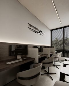 עמדות עבודה בפרויקט משרדים של סטודיו 73: משטח עץ רציף, תאורה לינארית וחלונות לאורך הקיר